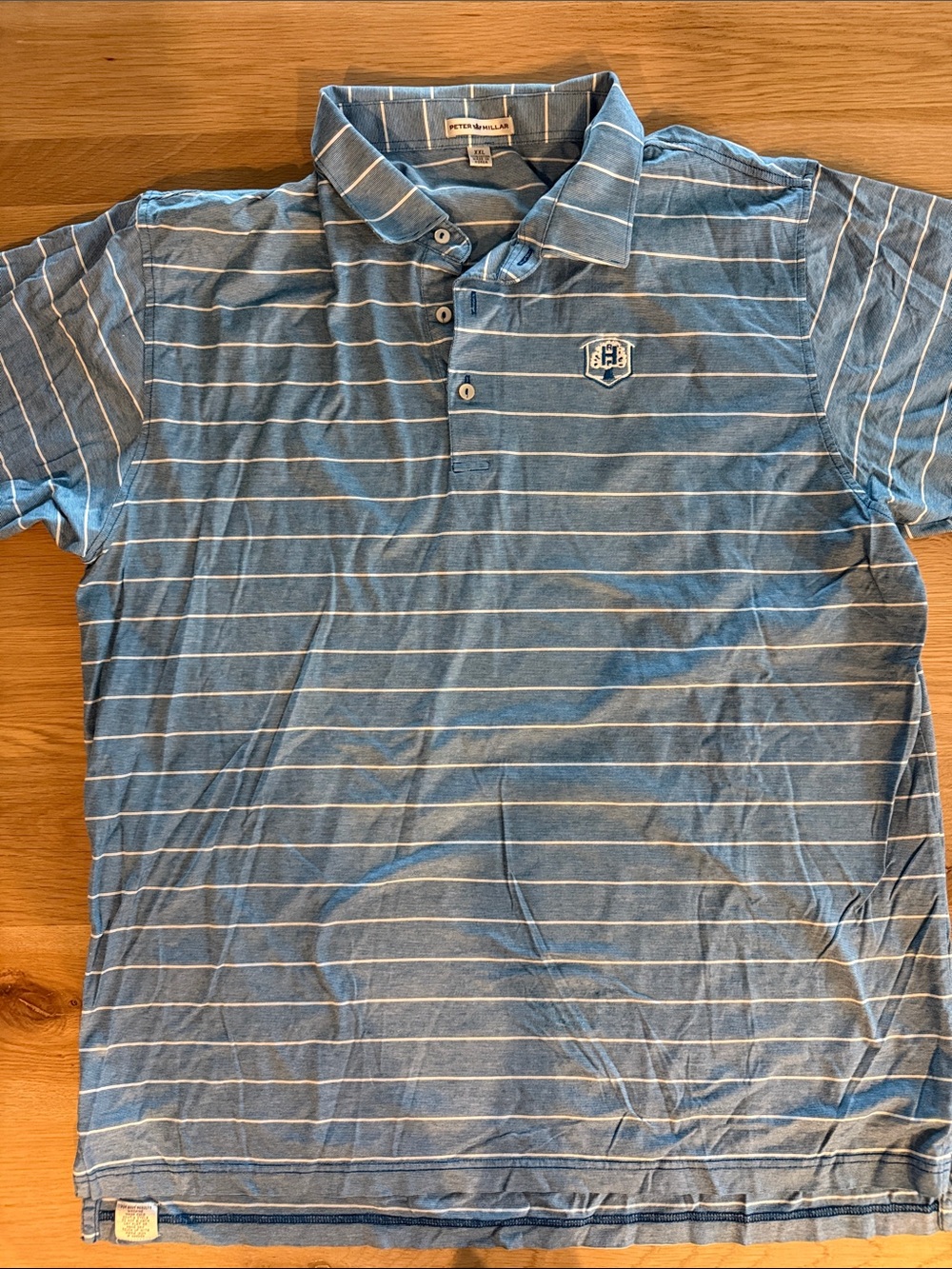 Peter Millar Light Blue Striped Polo with Chest Crest